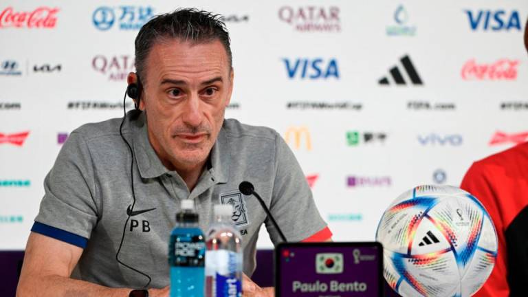 South Korea's Portuguese coach Paulo Bento attends a press conference at the Qatar National Convention Center (QNCC) in Doha on December 4, 2022, on the eve of the Qatar 2022 World Cup football match between Brazil and South Korea. AFPPIX
