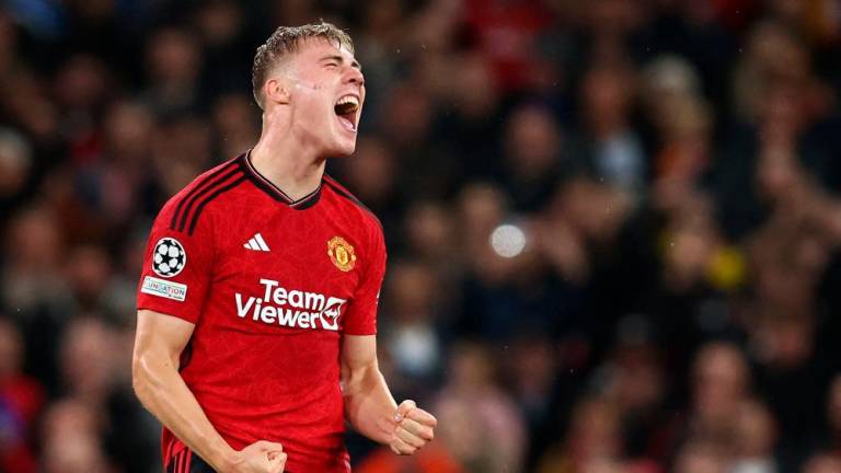 Manchester United’s Danish striker #11 Rasmus Hojlund celebrates scoring the opening goal during the UEFA Champions league group A football match between Manchester United and Galatasaray at Old Trafford stadium in Manchester, north west England, on October 3, 2023/AFPPix