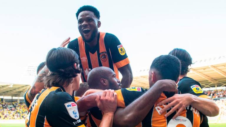 Hull went to the top of English football’s second-tier Championship with a 2-1 victory over Norwich on Saturday that meant the Canaries remained without a win. Credit: @HullCity