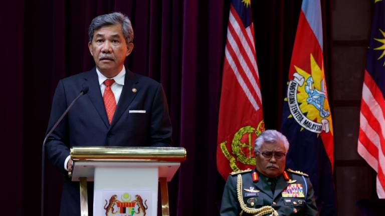 KUALA LUMPUR, March 22 -- Defense Minister Datuk Seri Mohamad Hasan when speaking at the Army Commander’s Rank and Handover Ceremony at the Wisma Pertahanan Auditorium today. BERNAMAPIX