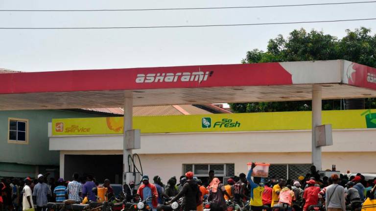 Motorbike taxis converge to buy fuel at a petrol station at Ibafo, Ogun State in southwest Nigeria, on May 30, 2023/AFPPix