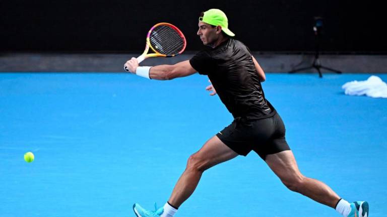 Spain's Rafael Nadal hits a return during a practice session ahead of the Australian Open tennis tournament in Melbourne on January 12, 2023. - AFPPIX