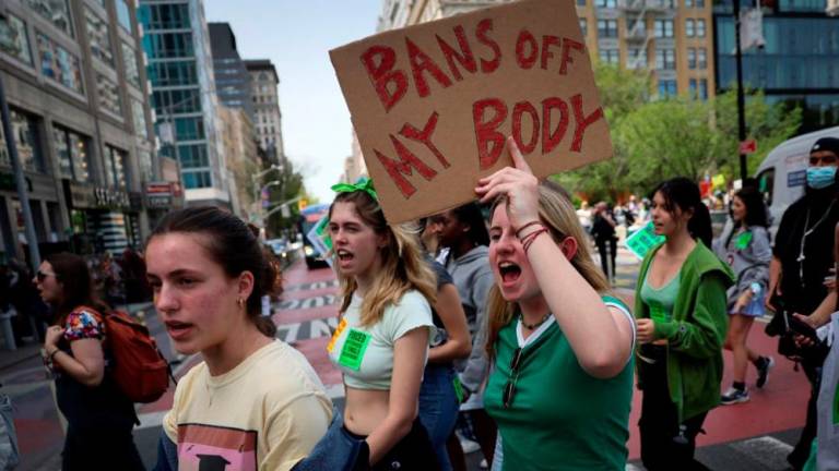 File photo: Students and others protest for abortion rights as they march from Union Square, after the leak of a draft majority opinion written by Justice Samuel Alito preparing for a majority of the court to overturn the landmark Roe v. Wade abortion rights decision later this year, in Manhattan in New York City, New York, U.S., May 5, 2022. REUTERSpix