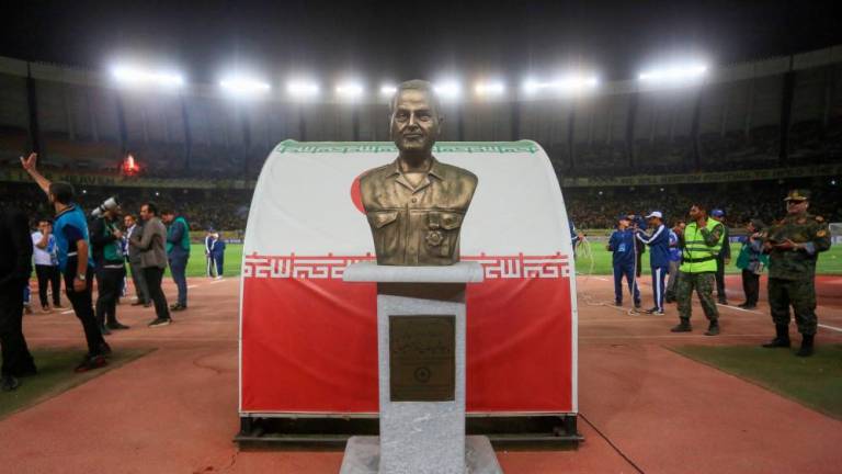 A bust of slain Revolutionary Guards commander Qasem Soleimani on the pitch at the Naghsh-e-Jahan Stadium in Isfahan during the AFC Champions League Group C football match between Iran’s Sepahan and Saudi Arabia’s Al-Ittihad. AFPPIX