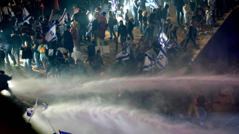 Protesters clash with the police during a rally against the Israeli government's judicial reform in Tel Aviv, Israel on March 27, 2023. AFPPIX