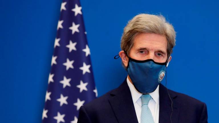 US Special Presidential Envoy for Climate John Kerry attends a joint news conference with French Economy and Finance Minister Bruno Le Maire (not seen) after a meeting at the Bercy Finance Ministry in Paris, France, March 10, 2021. REUTERSpix