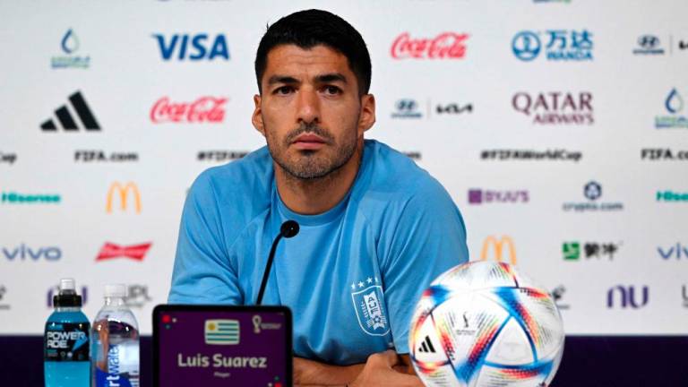 Uruguay’s forward #09 Luis Suarez gives a press conference at the Qatar National Convention Center (QNCC) in Doha on December 1, 2022, on the eve of the Qatar 2022 World Cup football match between Ghana and Uruguay/AFPPix