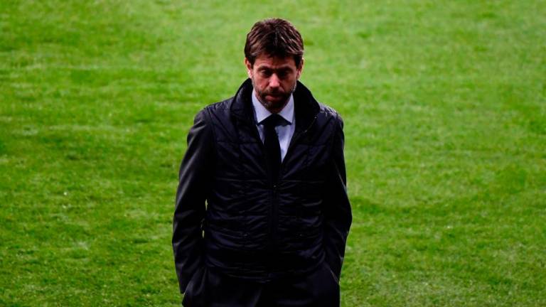 In this file photo taken on February 19, 2019 Juventus’ Italian president Andrea Agnelli stands on the pitch during a walk-around at the Wanda Metropolitan stadium in Madrid ahead of the UEFA Champions League round of 16 first leg football match between Atletico Madrid and Juventus/AFPPix