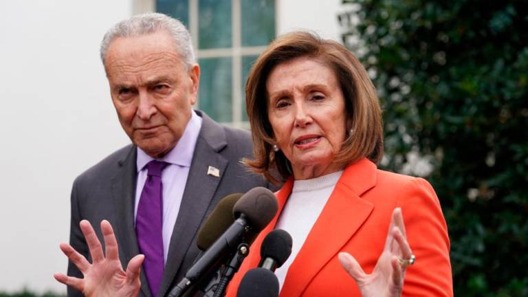 Speaker of the House Nancy Pelosi and Senate Majority Leader Chuck Schumer speak to reporters after a meeting with U.S. President Joe Biden and other congressional leaders at the White House in Washington, U.S., November 29, 2022. REUTERSPIX