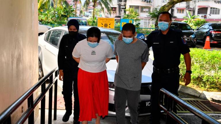 KUALA LUMPUR, Sept 23 -- A husband and wife were charged in the Ampang Sessions Court today on two charges of abusing two brothers who are also their nephews to the point of physical injury. BERNAMAPIX