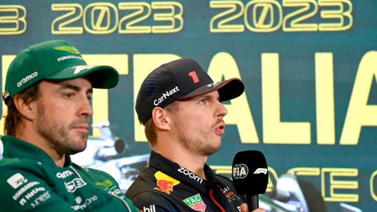 Red Bull Racing’s Dutch driver Max Verstappen (R) speaks at a drivers press conference next to Aston Martin’s Spanish driver Fernando Alonso ahead of the 2023 Formula One Australian Grand Prix at the Albert Park Circuit in Melbourne on March 30, 2023/AFPPix