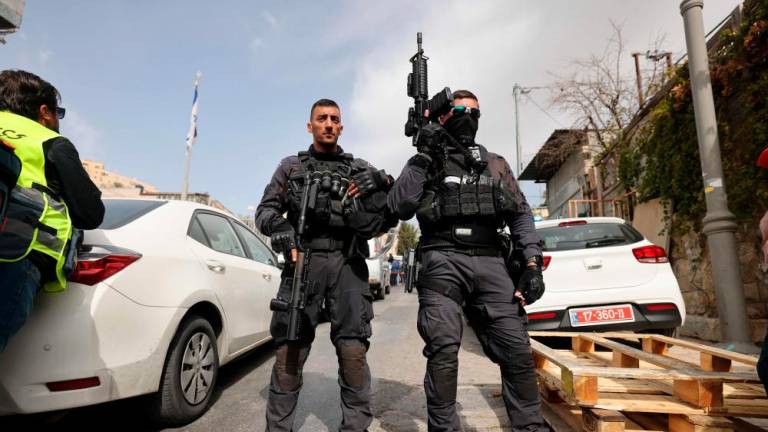 Israeli security forces stand guard in Jerusalem’s predominantly Arab neighbourhood of Silwan, where an assailant reportedly shot and wounded two people, on January 28, 2023. AFPPIX
