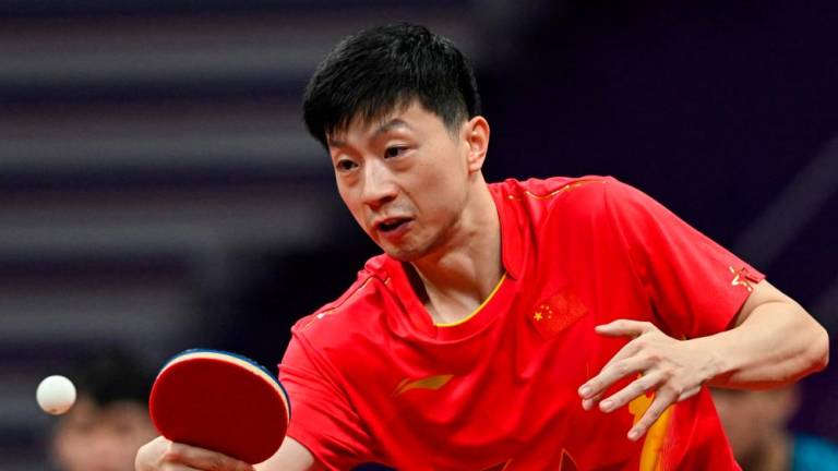 Ma Long hits a return against South Korea’s Park Ganghyeon in their men’s team final table tennis match during the Hangzhou 2022 Asian Games in Hangzhou, in China’s eastern Zhejiang province on September 26, 2023. AFPPIX