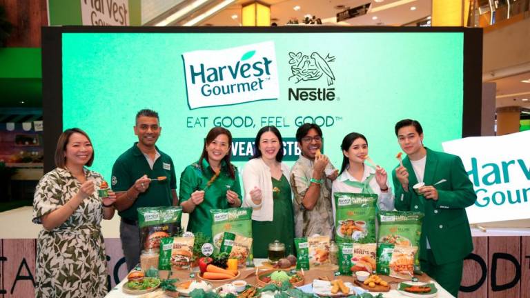 From left: Nestle Professional Malaysia Food Business Manager, Christine Lee; Nestle Malaysia and Singapore Head of Exports Business, Rajesh Singh; Nestle Professional Malaysia and Singapore Business Executive Officer, Yit Woon Lai; Head of Nestle Plant-Based Meal Solutions Malaysia and Singapore, Yap; Friend of Nestle Harvest Gourmet, Arwind; Friend of Nestle Harvest Gourmet, Qiu Wen; Friend of Nestle Harvest Gourmet, Schatzmann at the official launch of the #LoveAtFirstBite campaign. – PICS BY NESTLE HARVEST GOURMET