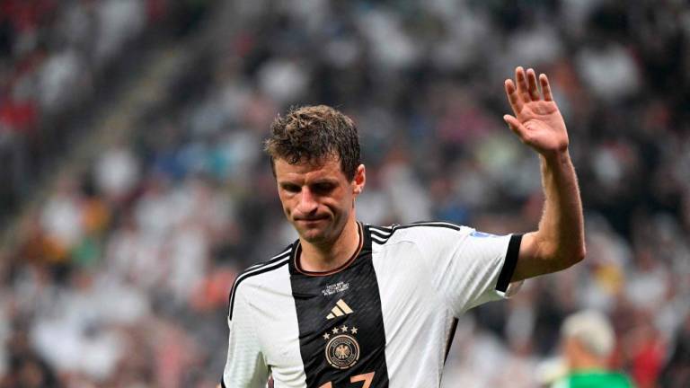Germany’s forward #13 Thomas Mueller gestures during the Qatar 2022 World Cup Group E football match between Costa Rica and Germany at the Al-Bayt Stadium in Al Khor, north of Doha on December 1, 2022. AFPPIX
