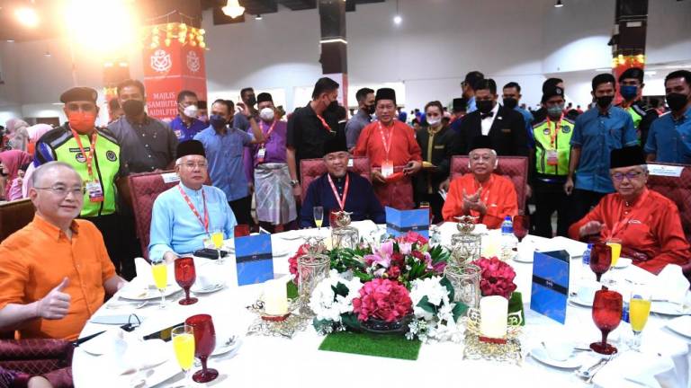 KUALA LUMPUR, May 15 - UMNO President Datuk Seri Dr Ahmad Zahid Hamidi (seated, center) with UMNO Vice President Datuk Seri Ismail Sabri Yaakob (seated, two right), former Prime Minister Datuk Seri Najib Tun Razak (seated, two left) while attending the Hari Raya Aidilfitri Banquet at the Kuala Lumpur World Trade Center (WTCKL) today. BERNAMAPIX