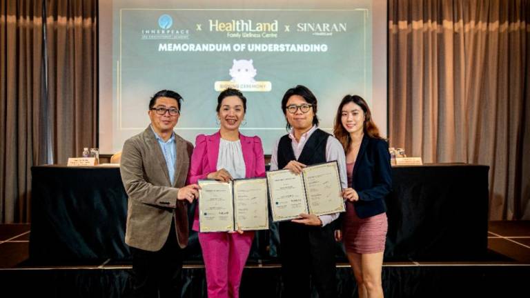 From left: Inner Peace Spa Consultancy managing director Kennedy Jie John, founder and head of training Alyssa Lim, HealthLand head of innovation Max Phoo, and assistant business development manager Kahyi Cheong, during the MoU signing.