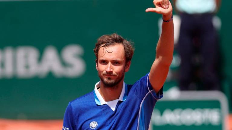 Daniil Medvedev reacts after winning against Serbia’s Miomir Kecmanovic during their men’s singles match on day seven of the Roland-Garros Open tennis tournament at the Court Suzanne-Lenglen in Paris on May 28, 2022. AFPPIX