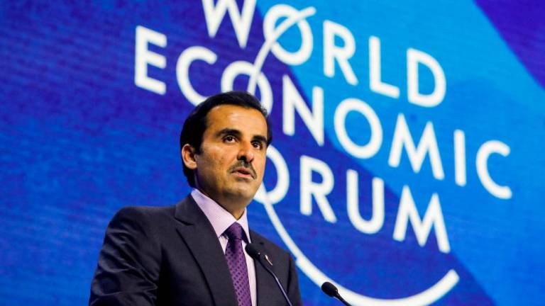 Qatar’s Emir Tamim Bin Hamad Bin Khalifa Al Thani addresses the delegates of the World Economic Forum (WEF) in Davos, Switzerland May 23, 2022. REUTERSPIX