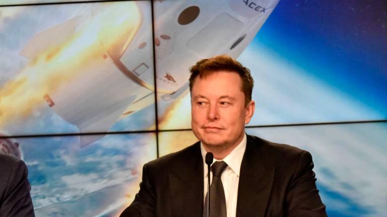 FILE PHOTO: SpaceX founder and chief engineer Elon Musk attends a news conference at the Kennedy Space Center in Cape Canaveral, Florida, U.S. January 19, 2020. REUTERSPIX