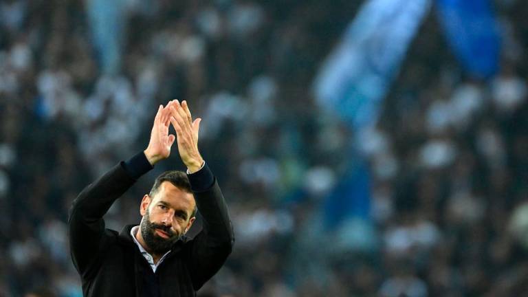 PSV’s Dutch head coach Ruud van Nistelrooy applauds supporters at the end of the UEFA Europa League football 1st round day 3 group A match between FC Zurich and PSV Eindhoven at Letzigrund stadium in Zurich on October 6, 2022. AFPPIX