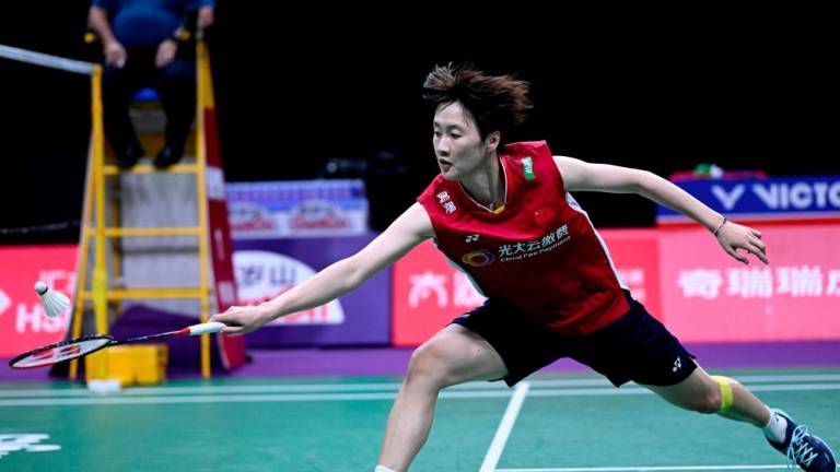 China's Chen Yufei hits a return against Japan's Akane Yamaguchi during their women's singles semi-final match at the 2023 Sudirman Cup world badminton championships in Suzhou in China's eastern Jiangsu province on May 20, 2023. - AFPPIX