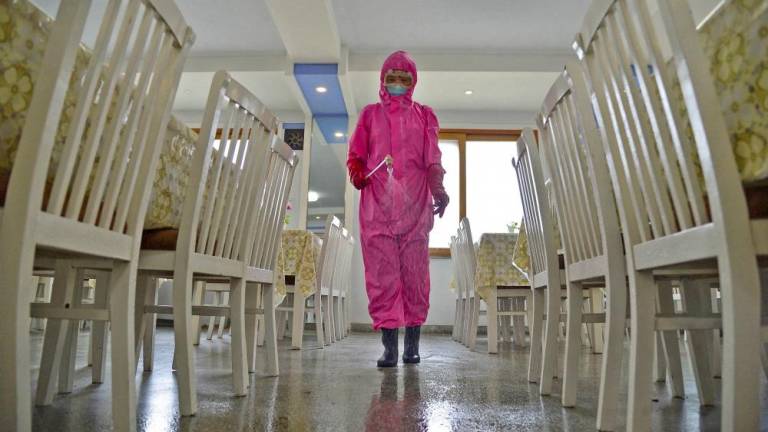 A worker disinfects a dining room at a sanitary supplies factory, amid growing fears over the spread of the coronavirus disease (Covid-19), in Pyongyang, North Korea, in this photo taken on May 16, 2022 and released by Kyodo on May 17, 2022. Kyodo/via REUTERSpix