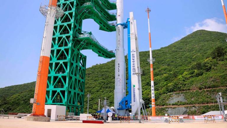 This handout photo taken on May 23, 2023 and provided by Korea Aerospace Research Institute (KARI) shows South Korea’s homegrown space rocket Nuri on its launch pad at the Naro Space Centre in the southern coastal village of Goheung, a day before its third attempt to put satellites into orbit. AFPPIX