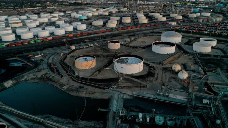 Storage tanks for crude oil, petrol, diesel, and other refined petroleum products at the Kinder Morgan Terminal in Carson, California.– Reuterspix