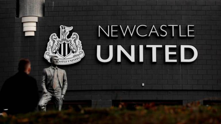 Football - General views outside Newcastle United’s St James’ Park stadium - St James’ Park, Newcastle, Britain - October 7, 2021 General view of the Bobby Robson Statue outside Newcastle United’s St James’ Park stadium. REUTERSPIX
