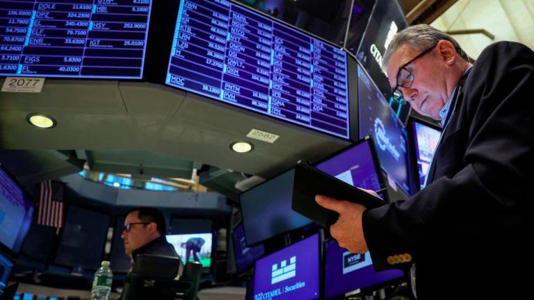 Traders working on the floor of the New York Stock Exchange on Wednesday, March 29, 2023. – Reuterspic