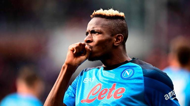 Napoli’s Nigerian forward Victor Osimhen celebrates after scoring his side’s third goal during the Italian Serie A football match between Torino and Napoli on March 19, 2023 at the Olympic stadium in Turin. AFPPIX