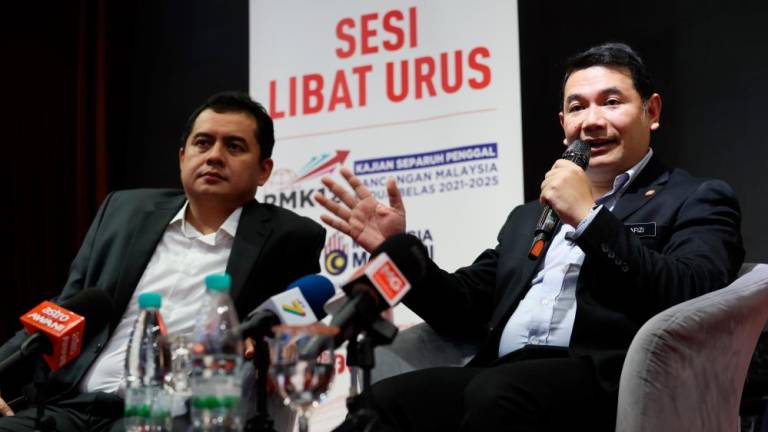 KUANTAN, May 16 -- Economy Minister Rafizi Ramli (right) spoke during a press conference at the Management Engagement Session (SKU) of the Half Term Review (KSP) of the 12th Malaysia Plan 2021-2025 with the Pahang State Government, today. BERNAMAPIX