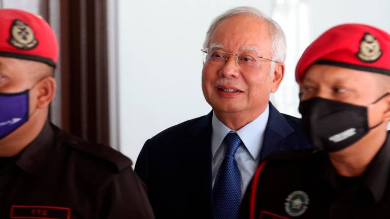 KUALA LUMPUR, Feb 2 -- Former Prime Minister Datuk Seri Najib Tun Razak (centre) was present at the Kuala Lumpur Court Complex today for the continuation of the trial proceedings regarding the 1Malaysia Development Berhad (1MDB) case. BERNAMAPIX
