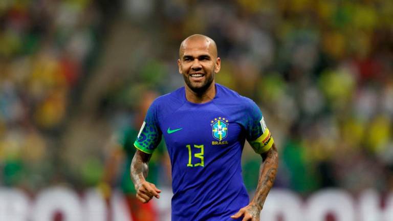 Brazil’s defender #13 Dani Alves reacts during the Qatar 2022 World Cup Group G football match between Cameroon and Brazil at the Lusail Stadium in Lusail, north of Doha on December 2, 2022/AFPPix