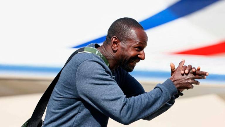 French hostage journalist Olivier Dubois, who was held hostage in Mali for nearly two years by the Support Group for Islam and Muslims (GSIM), reacts as he arrives at the Villacoublay airport, in Velizy-Villacoublay, near Paris, on March 21, 2023. AFPPIX