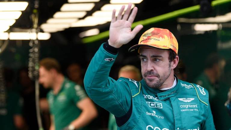 Aston Martin’s Spanish driver Fernando Alonso waves during the second free practice session of the Spanish Formula One Grand Prix at the Circuit de Catalunya on June 2, 2023 in Montmelo, on the outskirts of Barcelona/AFPPix