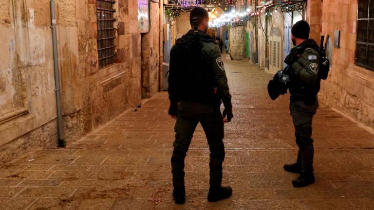 Israeli police stand guard near a security incident scene near Al-Aqsa compound also known to Jews as the Temple Mount, in Jerusalem’s Old City, April 1, 2023. REUTERSpix