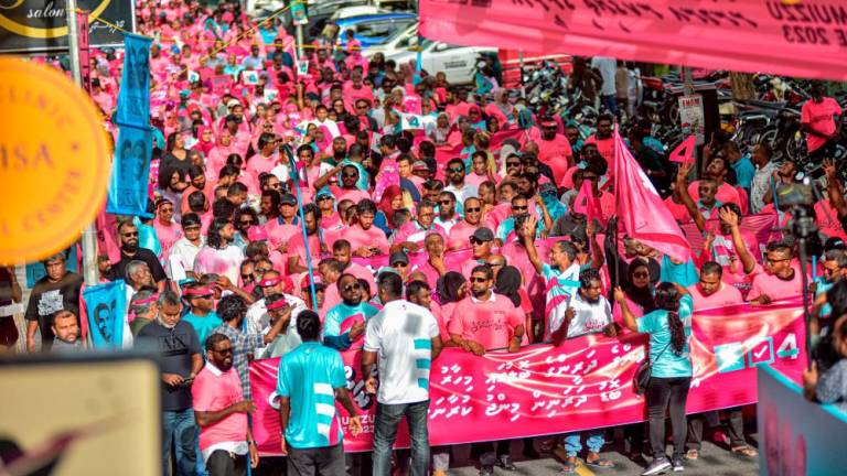 Supporters of People's National Congress (PNC) party take part in a campaign rally in Male on September 8, 2023. AFPPIX