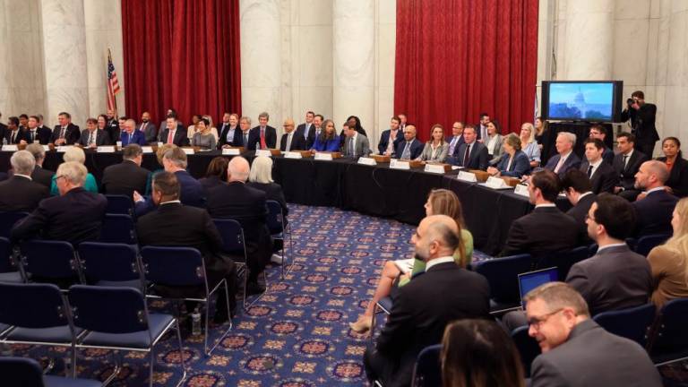 Top US technology leaders take their seats for the start of a bipartisan artificial intelligence forum for senators at the US Capitol in Washington on Wednesday. – Reuterspic
