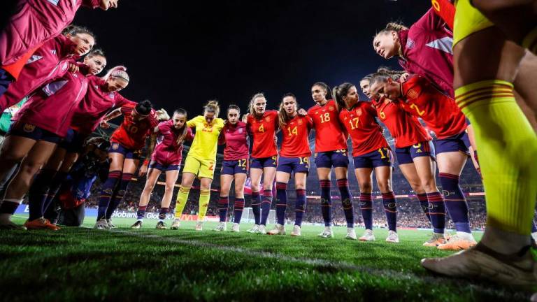 Spain's players stand in a huddle ahead of the Australia and New Zealand 2023 Women's World Cup final football match between Spain and England at Stadium Australia in Sydney on August 20, 2023. AFPPIX