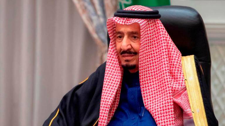 Saudi King Salman bin Abdulaziz addresses the kingdom’s advisory Shura Council from his royal palace in Neom, Saudi Arabia, December 29, 2021. REUTERSPIX