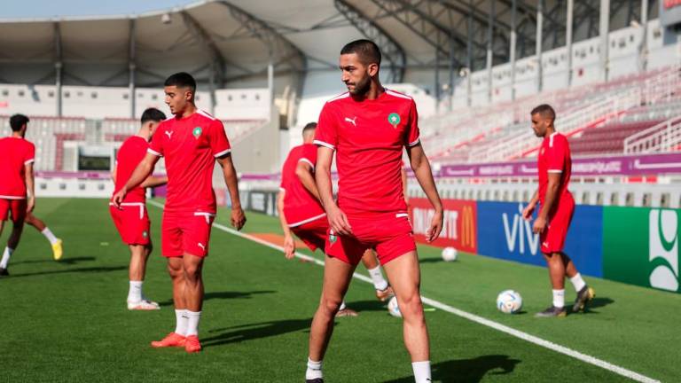 Morocco's midfielder Hakim Ziyech takes part in a training session at the Al Duhail SC Stadium in Doha on November 22, 2022, on the eve of the Qatar 2022 World Cup football tournament Group F match between Morocco and Croatia. - AFPPIX