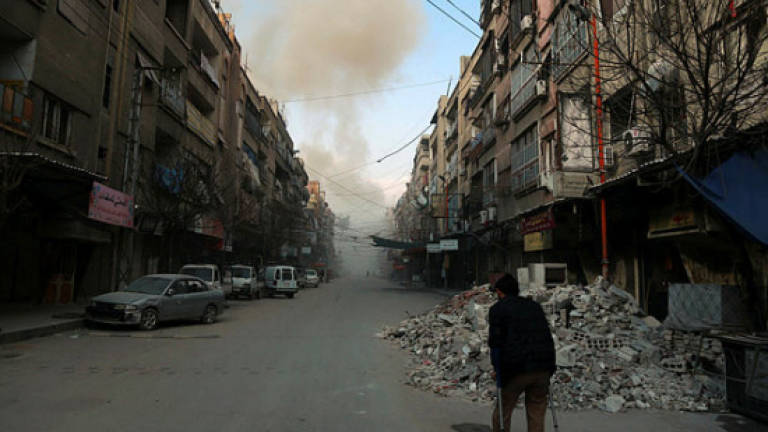 New strikes hit Syria enclave after UN delays truce vote
