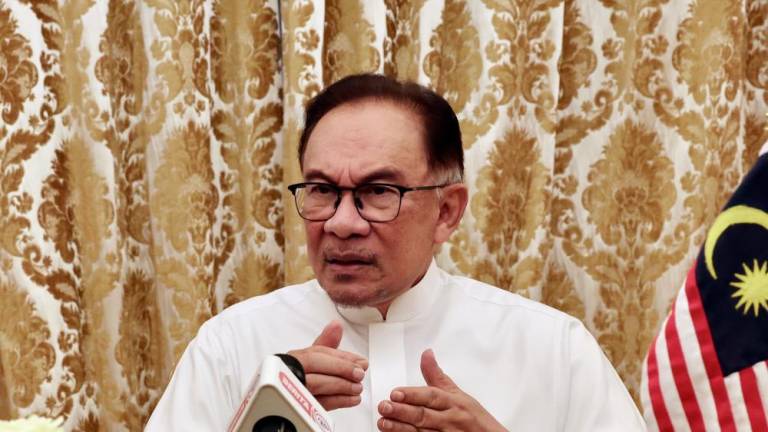 MEKAH, 22 Mac -- Perdana Menteri Datuk Seri Anwar Ibrahim mengadakan sidang media selepas pertemuan dengan Setiausaha Agung Persatuan Kerjasama Islam (OIC) Hissein Brahim Taha. - fotoBERNAMA