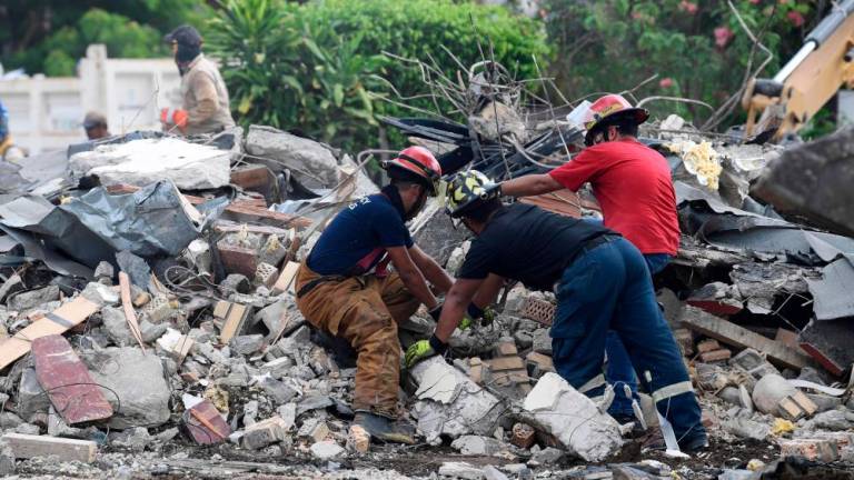 Rescuers and members of Civil Protection work amid the rubble after the roof of a church came crashing down on a baptism in Ciudad Madero, Tamapulipas state, Mexico, on October 2, 2023. AFPPIX