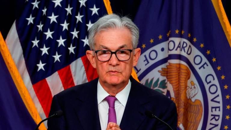 Powell speaking at a press conference after the release of the Fed policy decision to leave interest rates unchanged in Washington on Wednesday. – Reuterspic
