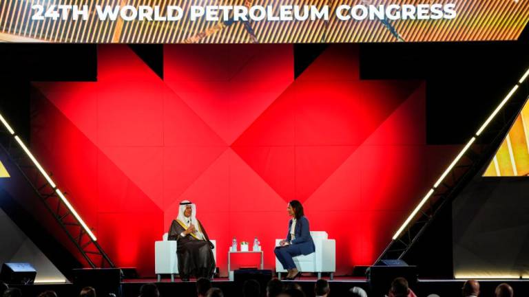Prince Abdulaziz speaks with Helima Croft of RBC Capital Markets during the World Petroleum Congress in Calgary on Monday. – Reuterspic