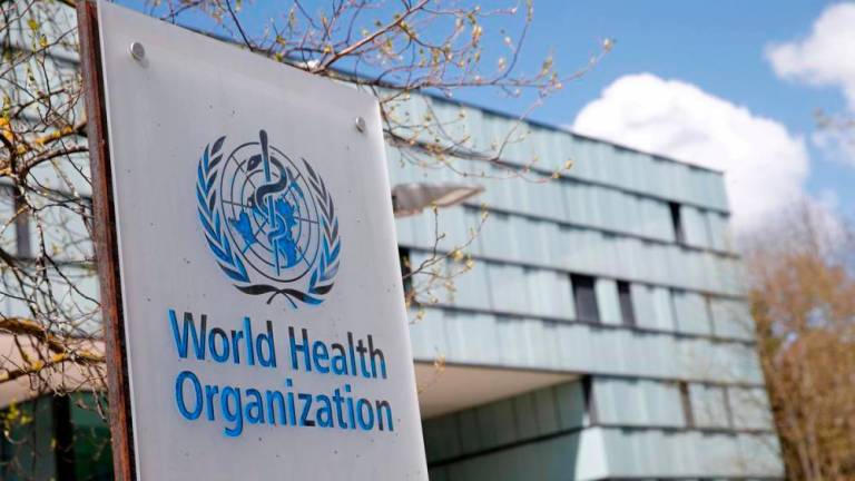 A logo is pictured outside a building of the World Health Organization (WHO) during an executive board meeting in Geneva, Switzerland, April 6, 2021. -REUTERSPix