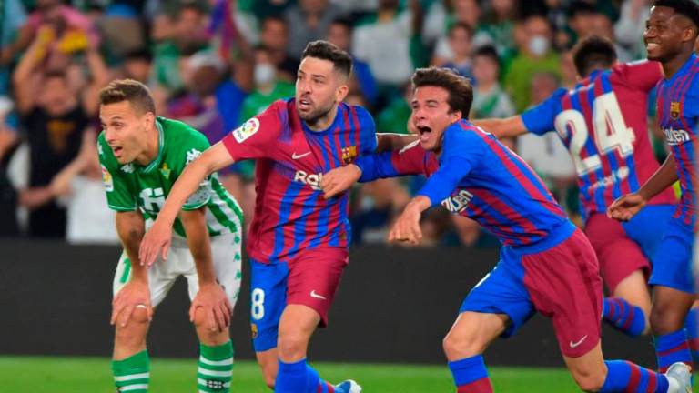 Jordi Alba celebrates after scoring a goal during the Spanish League football between Real Betis and FC Barcelona at the Benito Villamarin stadium in Seville on May 7, 2022. AFPpix